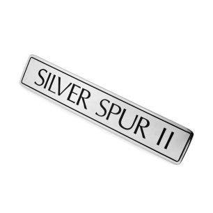 BADGE BOOT LID SPUR 11